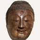 Head of the Buddha. China, 550-577 AD. Museum no. 98-1927