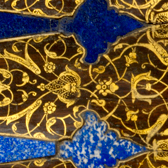 Gamesboard painted with arabesques