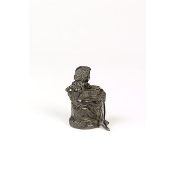Statuette - Seated boy holding a tub Statuette - Seated boy holding a tub