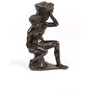 Statuette - A seated boy holding a shell