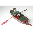 Clockwork toy boat and sailor