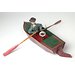 Clockwork toy boat and sailor