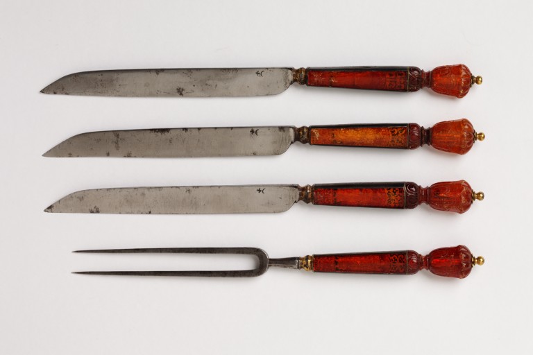 Steel fork with an amber handle, one of a set of one fork and twelve knives, ...