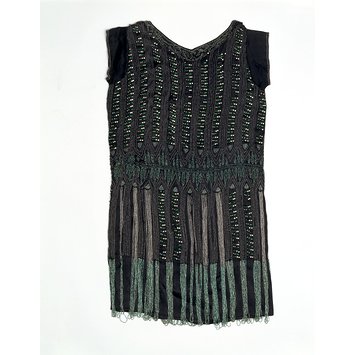 Evening dress and brooch