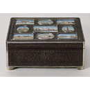 An oblong ebony box, carved with a floral pattern in relief, with an ivory miniature of the Qutb Minar, Delhi, on the lid. (Box)