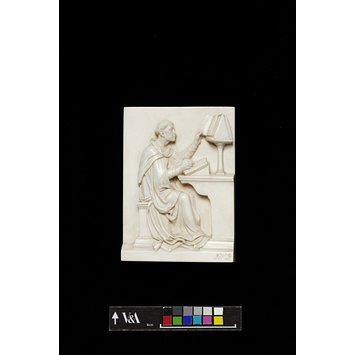 Plaque - A monk transcribing Plaque - A monk transcribing