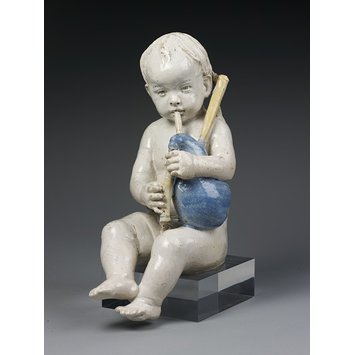 Boy playing the bagpipes (Figure)