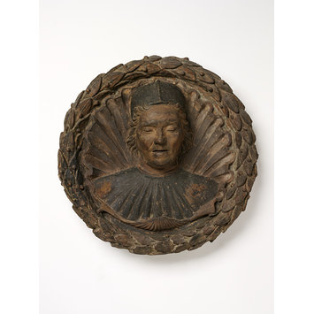 Roundel - Head of a man in a garland Roundel - Head of a man in a garland