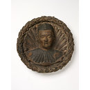 Roundel - Head of a man in a garland Roundel - Head of a man in a garland