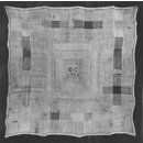Embroidered linen sampler