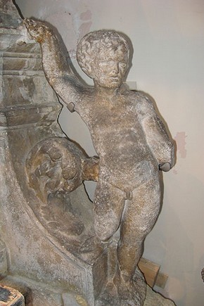 Figure 6. Stone figure on right of window during installation (Photography by Matthew Rose)