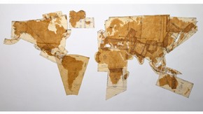 'Pattern of the World', tea and coffee stains on dressmaking pattern papers, Susan Stockwell, 2000. Museum no. E.1095-2000