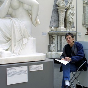 Visitor sketching in the Sculpture Gallery