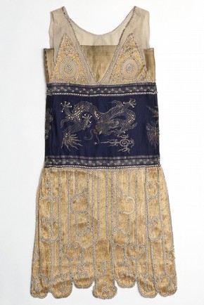 Navy and gold silk beaded evening dress with Chinese dragon motifs, by Jeanne Paquin for The Pavillon de L`Elégance, Paris Exhibition, France, 1925. Museum no. T.50-1948