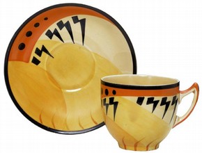 Painted earthenware cup and saucer, by Gray's Pottery, UK. About 1935. Museum no C.295E-1976