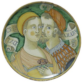Tin-glazed earthenware plate with the inscription ‘Dulce est amare’ (Sweet is love), from the workshop of Giacomo Mancini, Deruta, Italy, about 1550. Museum no. C.2116-1910