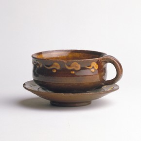 Bernard Leach, cup and saucer, earthenware, height 67mm, width 132mm, about 1920-24. Museum no. C.84, a-1972