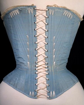 Corset (back view), blue silk stiffened with whalebone, possibly English or French, 1864. Museum no. T.169-1961