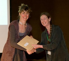 Sandra Haddock receiving the Museum of Childhood prize from Museum of childhood curator, Catherine Howell