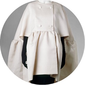 Woman's double breasted evening cape, white gazar, front view, designed by Cristóbal Balenciaga, France, February 1963. Museum no. T.31-1974