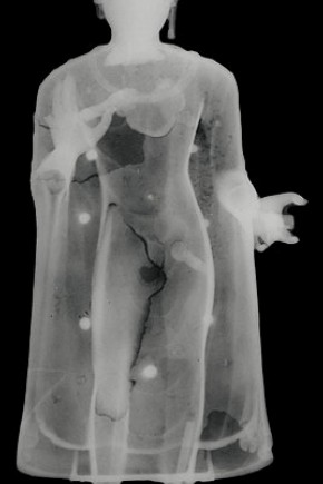 X-radiograph image of the Buddha, showing the chaplets (metal pins) that held the core