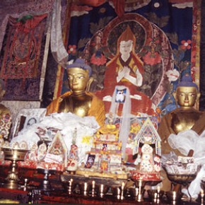 Altar at Shalu, Southern Tibet showing Buddha images in worship.