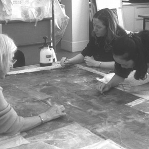 Removing the old lining papers from the wallpaper