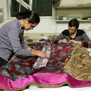 Textile conservators working on a costume for Diaghilev’s opera Boris Godunov