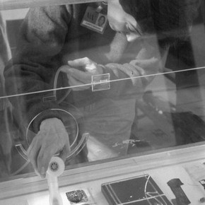 Figure 1. Experimenting with a method of applying consolidant using the nebulizer. Photography by Mike Wheeler.