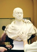 Installing a bust in the sculpture gallery