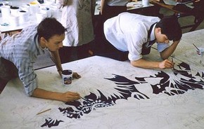 Students working on a mural