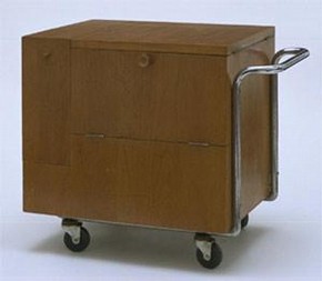 Kozma Drinks Trolley, designed by Zsuzsa Kozma (1913 - ), Budapest, Hungary, c1938-9. Given by Mr Peter Simor, Walnut, chromed metal, linoleum, later rubber wheels. Museum no. W.21-1997