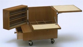 Kozma Drinks Trolley (open view), designed by Zsuzsa Kozma (1913 - ), Budapest, Hungary, c1938-9. Given by Mr Peter Simor, Walnut, chromed metal, linoleum, later rubber wheels. Museum no. W.21-1997