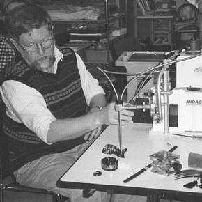 Figure 1. Scott Williams at work using the portable FTIR spectrometer in one of the studios of the Costume Institute. Photography by Silvia Valussi.