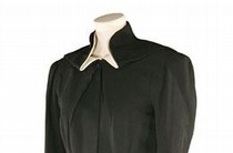 Charles James, black worsted wool coat with white cotton piqué collar, about 1938. Museum no. T.291-1078. Given by Miss Philipa Barnes