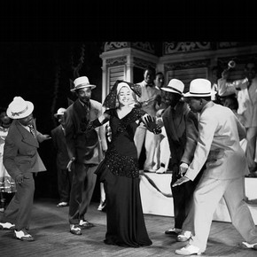 Zoot-suited performers and singer Mabel Lee in a performance of 'Carmen Jones' at the London Playhouse, 1948. Photograph by Houston Rogers