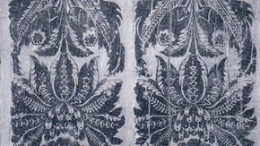 A Typical 18th century flock design. Red flock on a red background, now badly faded. Museum no. E 594-1922, about 1735, from the office of H.M.Privy Council