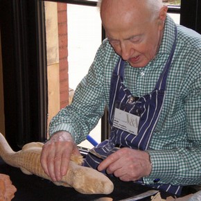 Maurice Lessof demonstrating the art of wood carving