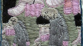 Figure 1: Embroidered hexagon. Coloured silks on white cotton ground. 2008. Image courtesy of Fine Cell Work, London