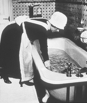 Parlourmaid preparing a Bath Before Dinner, Bill Brandt, 1939 © Bill Brandt Archive Ltd.