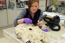 Star Wars Millennium Falcon spaceship being cleaned. Museum no. AAD/1994/17/1/1