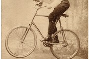 Trick Cyclist balancing on candles, late 19th century