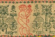 Sampler (detail), 1749. Museum no. T.205-1929. Given by Mrs Lewis F Day
