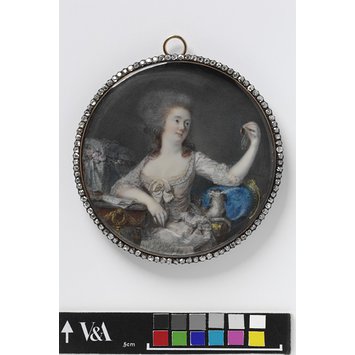 Portrait miniature - An unknown woman, said to be the Duchesse de Châteauroux, holding a miniature set in a bracelet Portrait miniature - An unknown woman, said to be the Duchesse de Châteauroux, holding a miniature set in a bracelet
