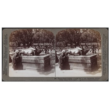 Photograph - Devout Woman stroking a Bronze Bull to Cure Rheumatism Photograph - Devout Woman stroking a Bronze Bull to Cure Rheumatism