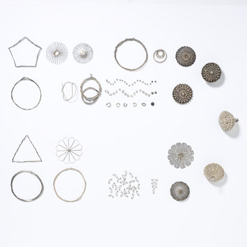 Elements of a filigree button Elements of a filigree button