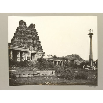 Photograph - Hampi (Vijayanagar) Bellary District: Eastern Gopura and Lamp Column, Vitthala Temple Complex. Photograph - Hampi (Vijayanagar) Bellary District: Eastern Gopura and Lamp Column, Vitthala Temple Complex.