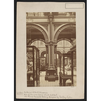 Photograph - South Kensington Museum, Interior view of South Court, looking eastward from Gallery 38 into Gallery 39, showing display cases in foreground and columns supporting Prince Consort Gallery Photograph - South Kensington Museum, Interior view of South Court, looking eastward from Gallery 38 into Gallery 39, showing display cases in foreground and columns supporting Prince Consort Gallery