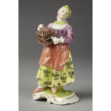 Lady with bird cage (Figure)