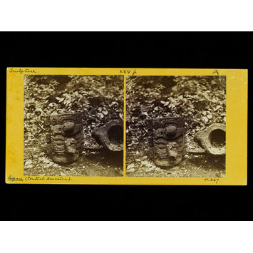 Photograph - Sculptured stones with faces on one side and hollowed at the top Photograph - Sculptured stones with faces on one side and hollowed at the top